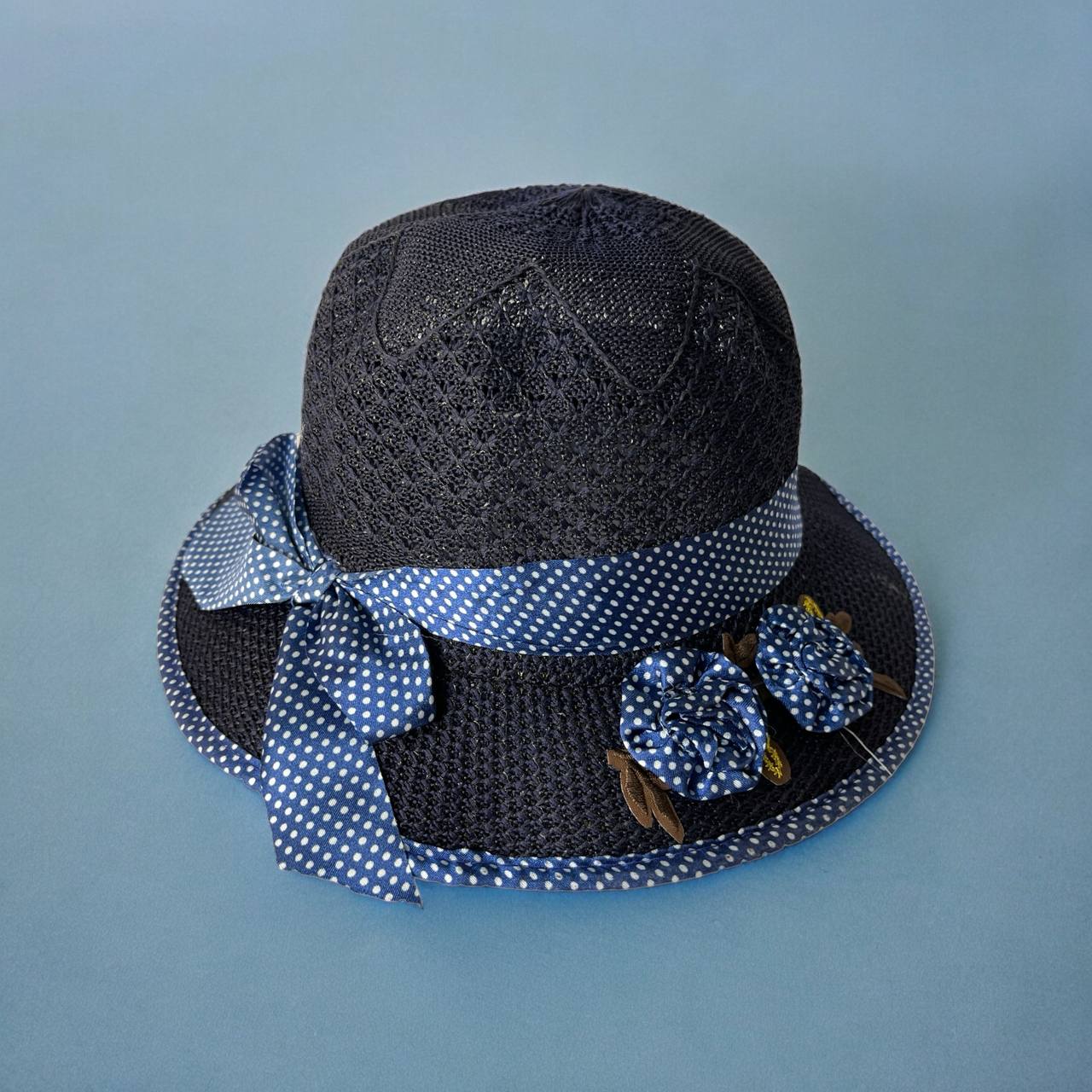 hat with blue ribbon