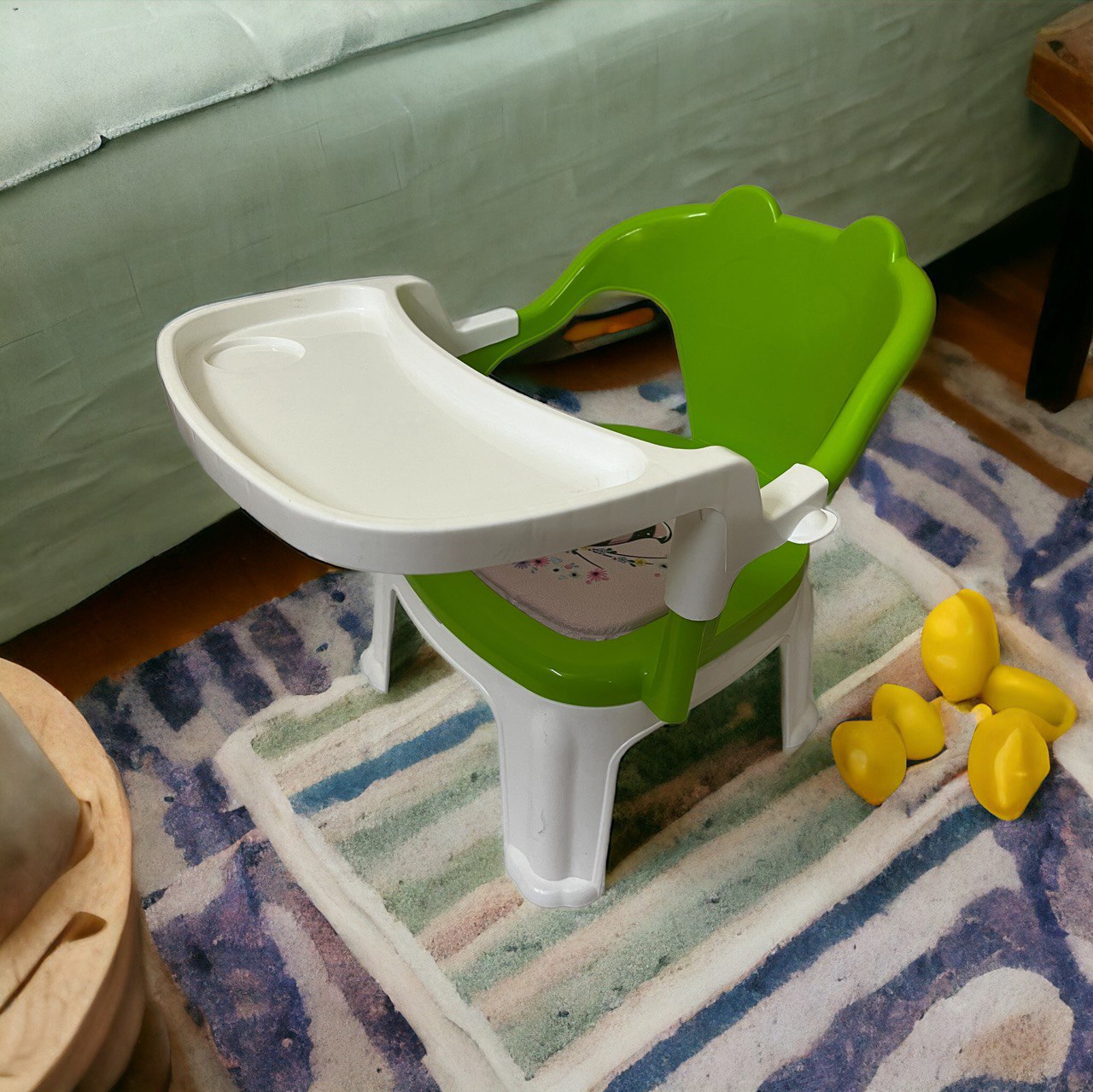 small chair is placed near a bed