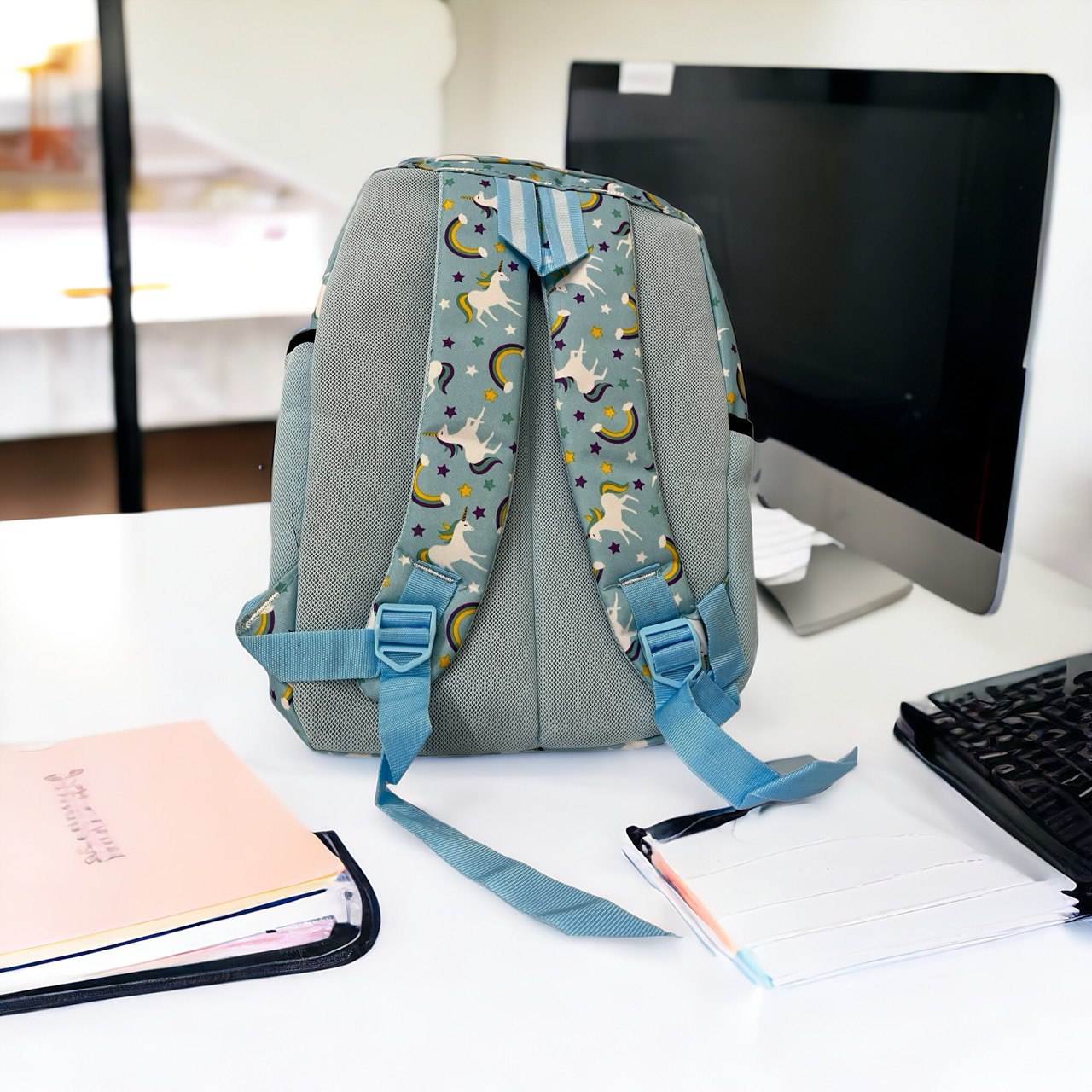 bag  near the computer 